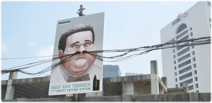 Гениальная реклама на столбах (25 фото)