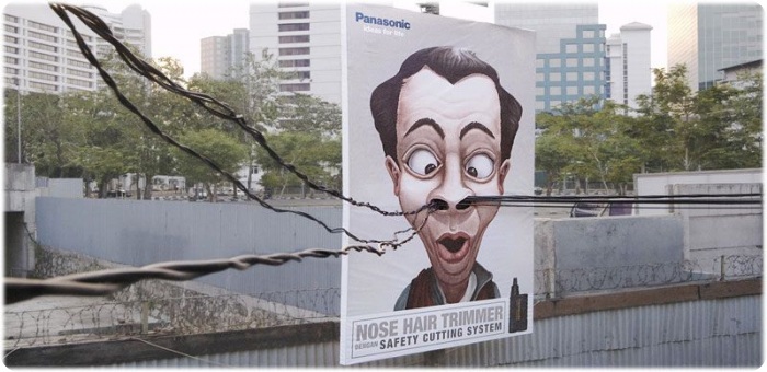 Гениальная реклама на столбах (25 фото)